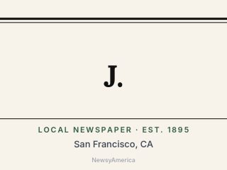 J.